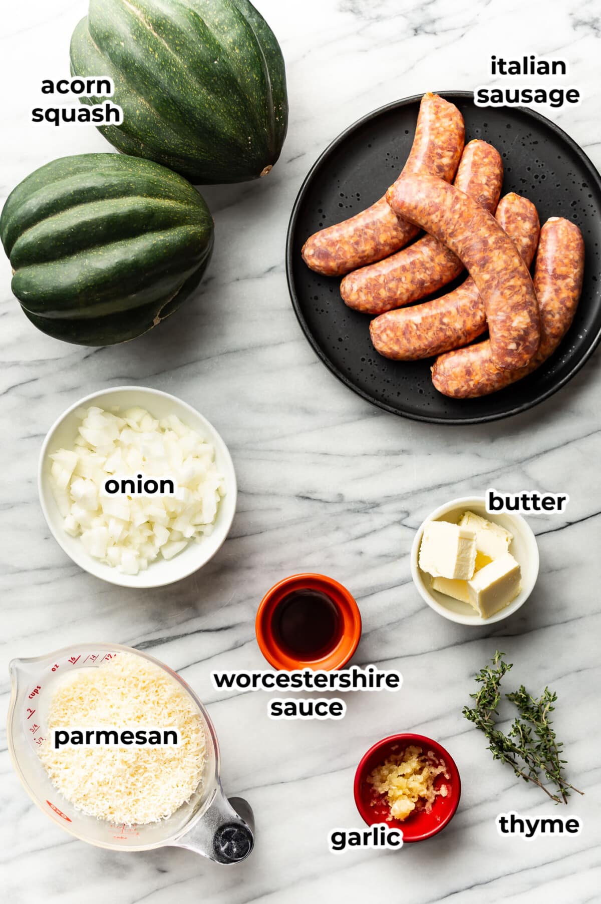 ingredients for sausage stuffed acorn squash in prep bowls