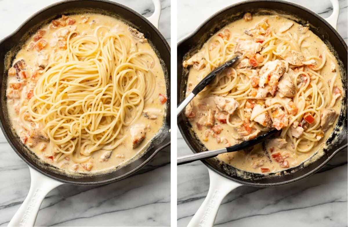 tossing spaghetti in a skillet to make fresh tomato salmon pasta with kitchen tongs