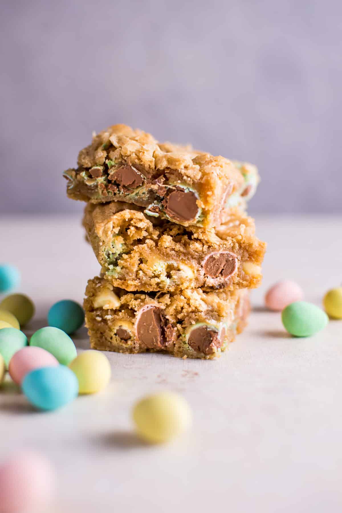 a stack of easter mini egg cookie bars
