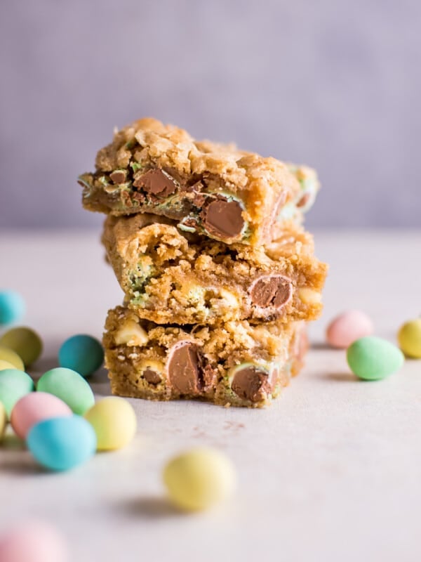 a stack of easter mini egg cookie bars