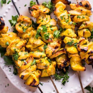 These grilled honey mustard chicken skewers are sure to become a family BBQ favorite this summer! The 3-ingredient marinade is super easy and tastes amazing.