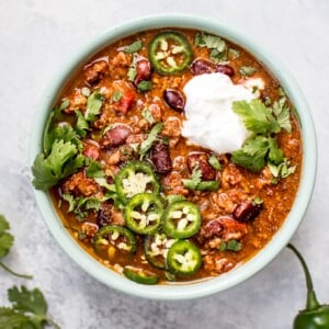 This easy crockpot turkey chili recipe is healthy, hearty, and comforting. A big batch will give you tons of tasty leftovers!