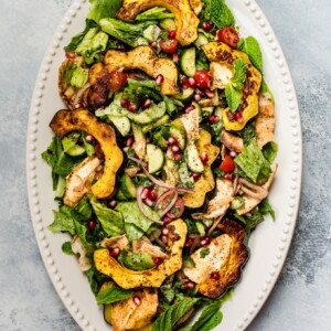 This fall fattoush salad recipe is fresh, bright, healthy, and given an autumn twist with roasted acorn squash. A beautiful addition to your dinner table!