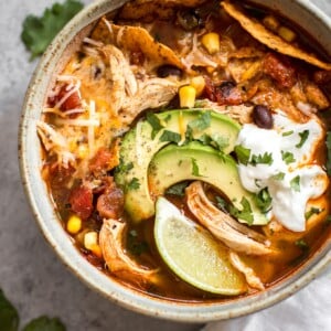 This easy Instant Pot chicken tortilla soup recipe tastes like it's been cooked low and slow, but it's fast and requires minimal effort!