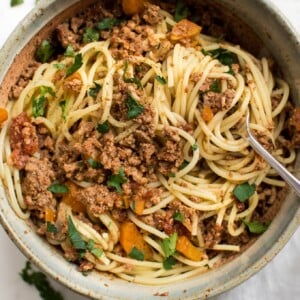 This healthy, quick, and hearty Instant Pot spaghetti sauce recipe makes a big batch perfect for freezing! This homemade tomato and meat sauce for pasta is sure to become a family favorite. A simple recipe from scratch.