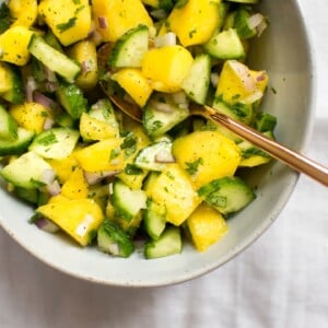 This fresh and healthy mango salsa recipe is easy to make and goes perfectly with grilled chicken, salmon, or even fish tacos. Make it spicy by adding jalapenos! This simple homemade salsa is vegan, quick and easy, and totally delicious.