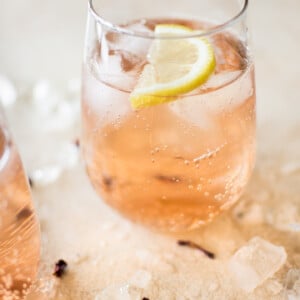 This easy, low-calorie rosé wine spritzer recipe makes the best summer drink. This blush skinny drink is made with sparkling club soda. It's perfect for girls' night or party!