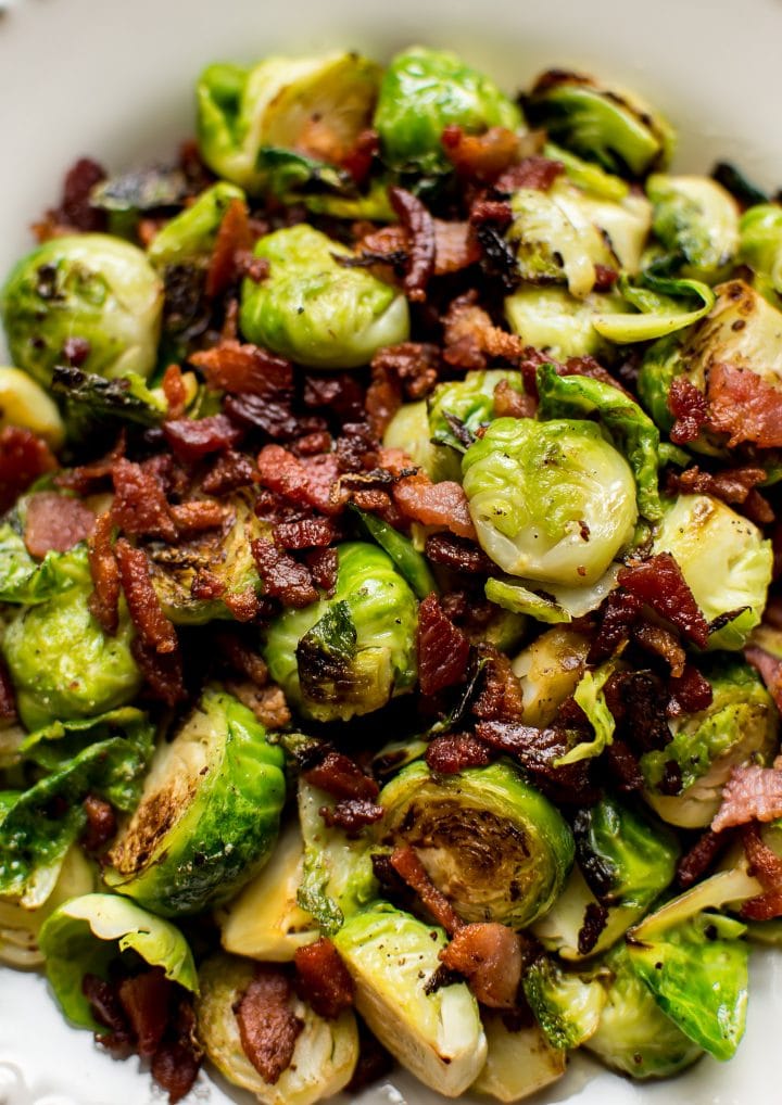 These bacon Brussels sprouts are an incredibly easy fall or winter side dish recipe with only two ingredients! Simple, quick, and delicious.