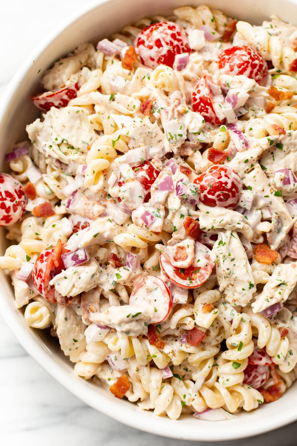a bowl of chicken bacon ranch pasta salad