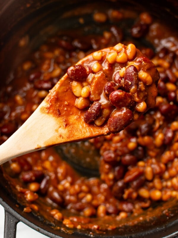 baked beans with a wooden spoon
