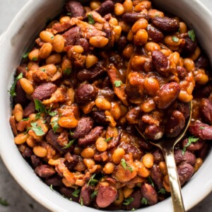 Easy homemade baked beans with bacon - a from scratch recipe that is perfect as a main course, side dish, or cookout/BBQ recipe.
