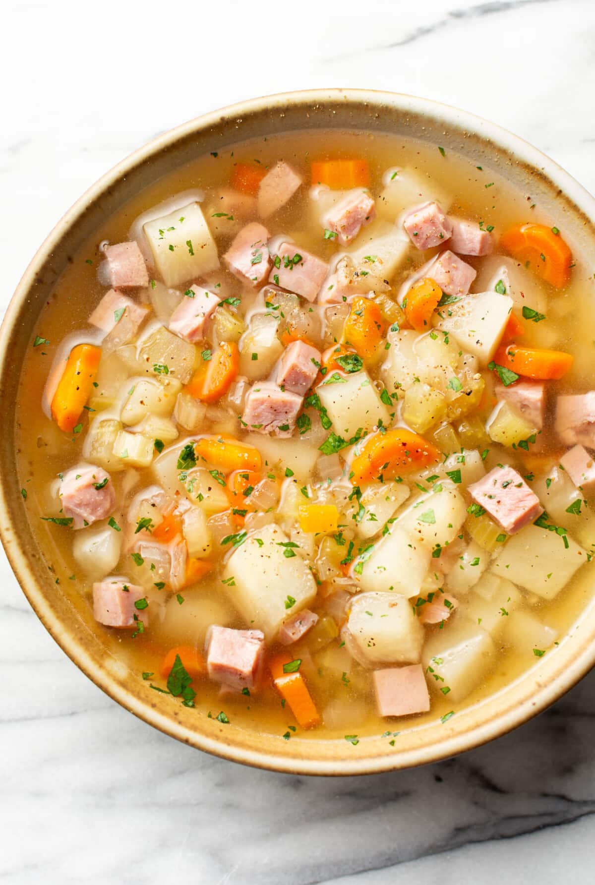 a bowl of crockpot ham and potato soup