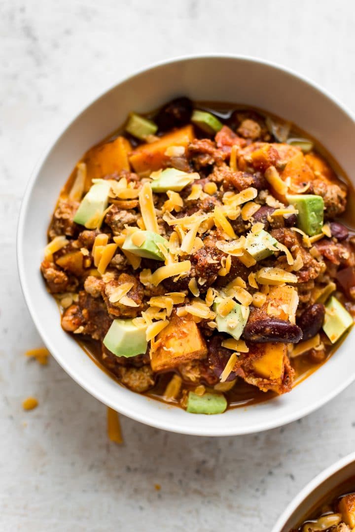 This healthy turkey sweet potato chili will soon become a new family favorite. Make it as spicy (or mild) as you like, and top it with cheddar, avocado, sour cream/Greek yogurt and/or anything else you can think of for a delicious and comforting meal. Perfect for meal prep!