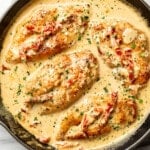 a skillet with creamy cajun chicken