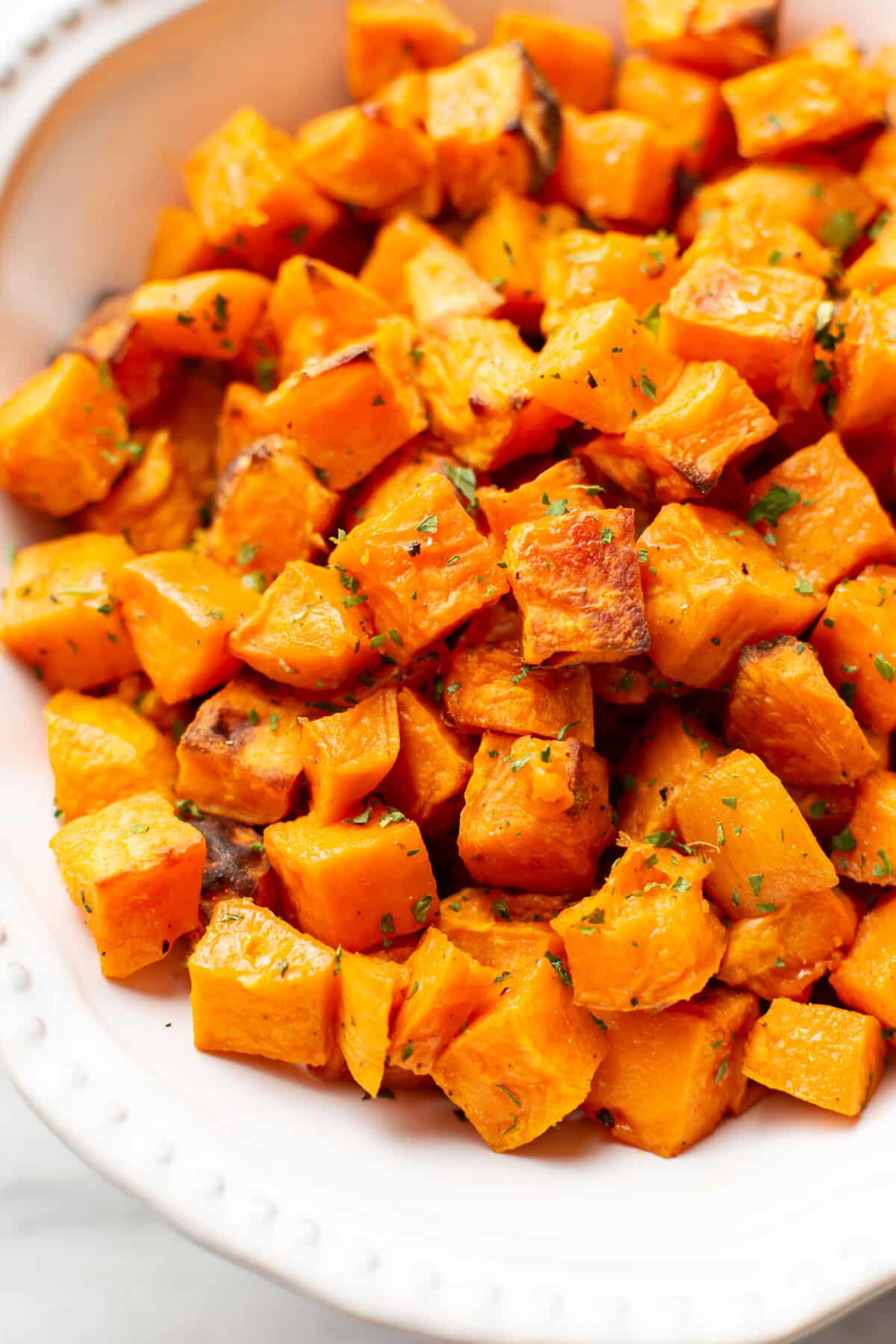 a bowl of roasted sweet potatoes