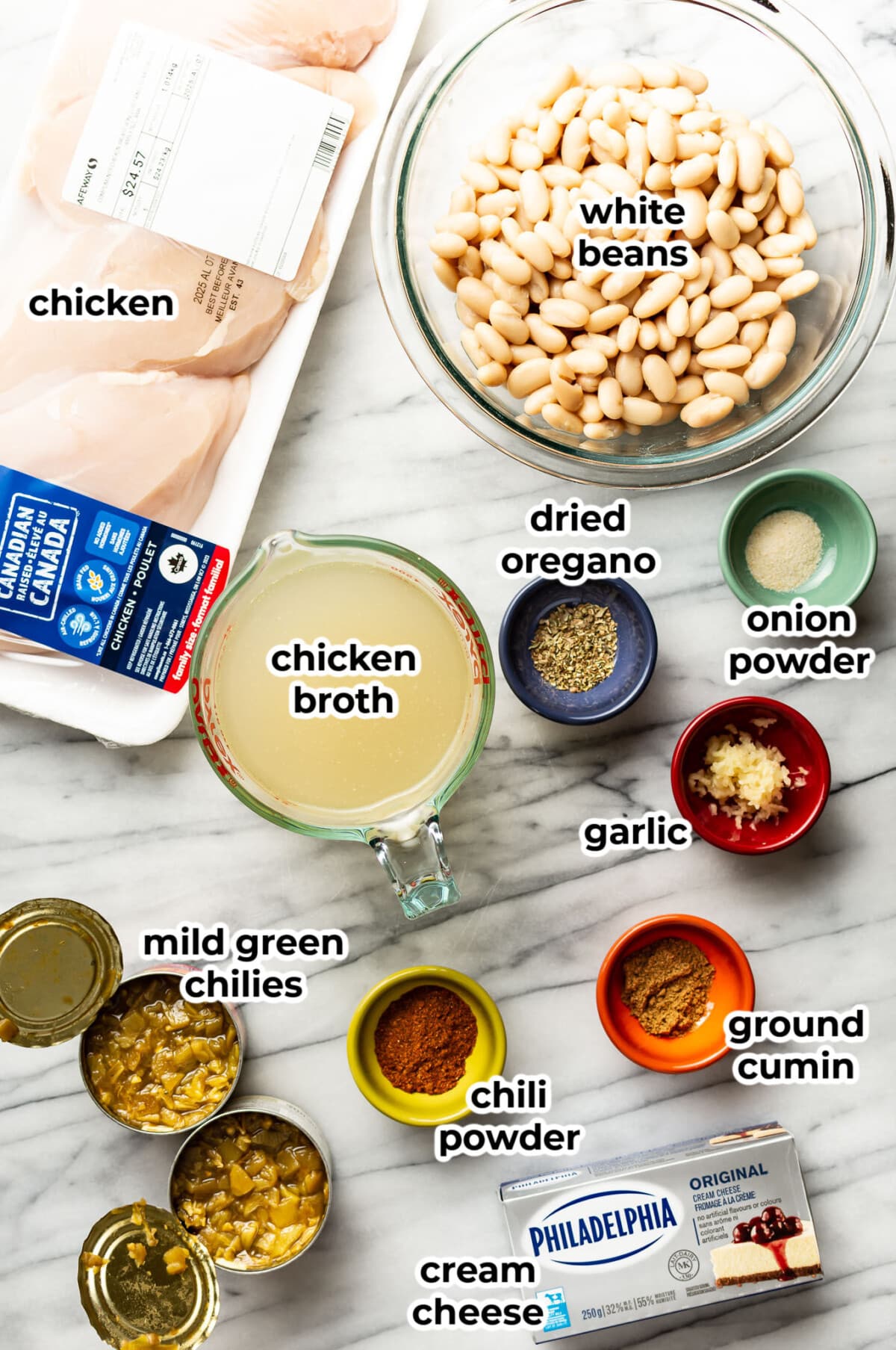 ingredients for slow cooker white chicken chili in prep bowls