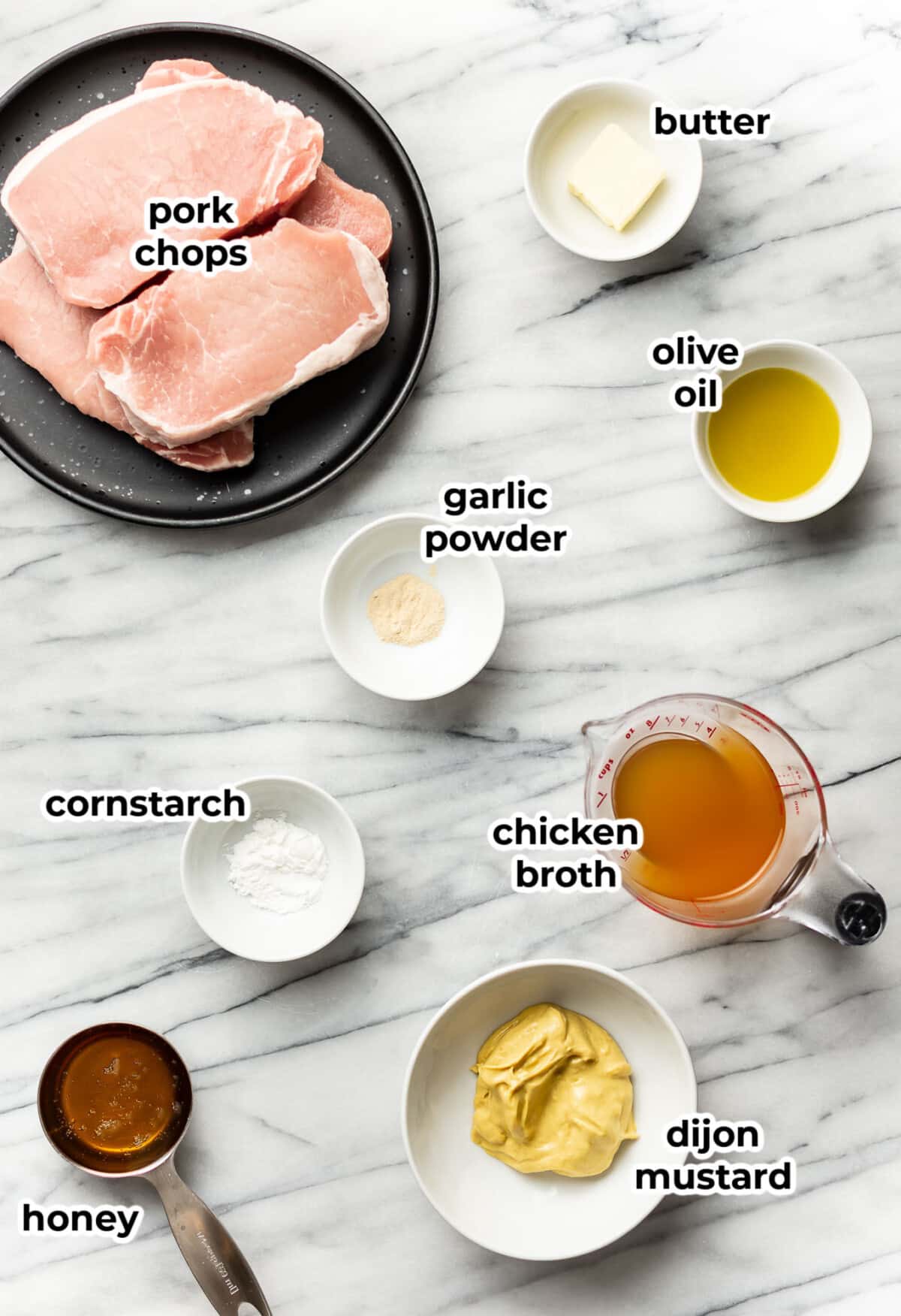 ingredients for honey mustard pork chops in prep bowls