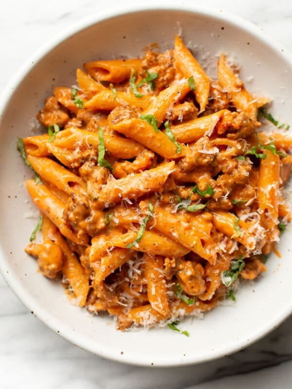 a bowl of penne alla vodka with sausage