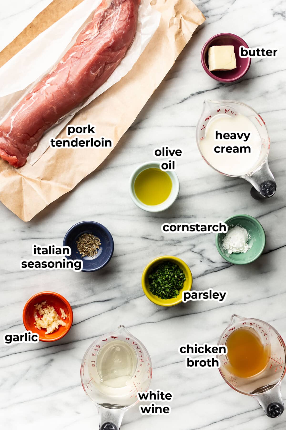 ingredients for creamy white wine pork tenderloin in prep bowls