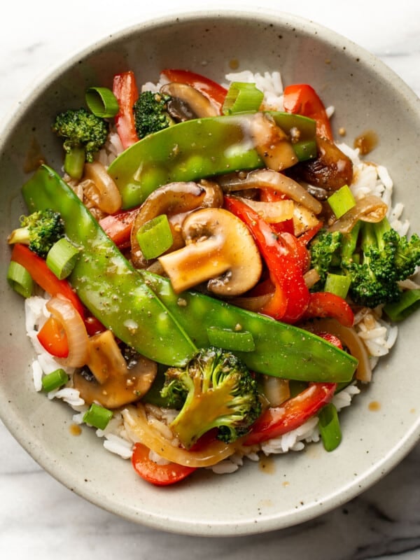 a bowl of vegetable stir fry with rice