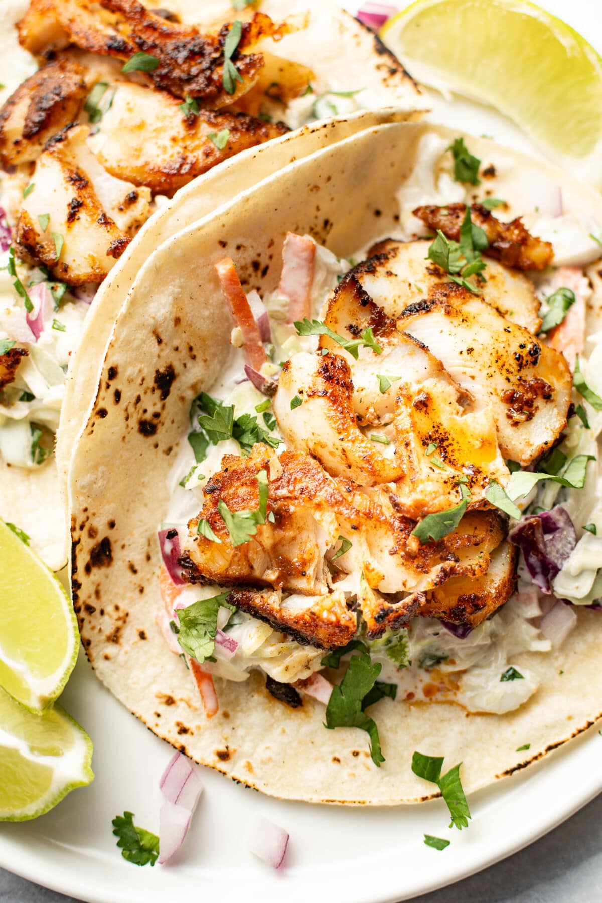 a plate with blackened fish tacos
