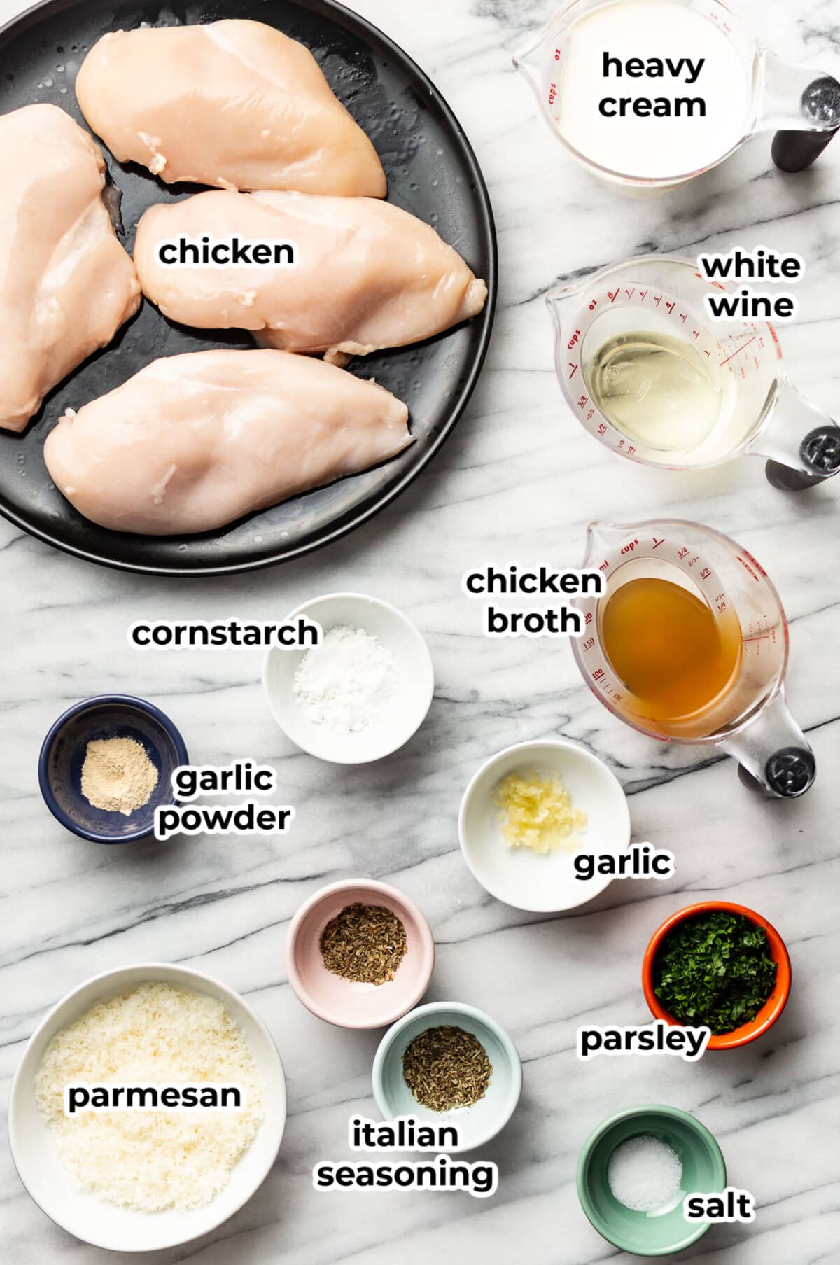 ingredients for baked white wine chicken in prep bowls