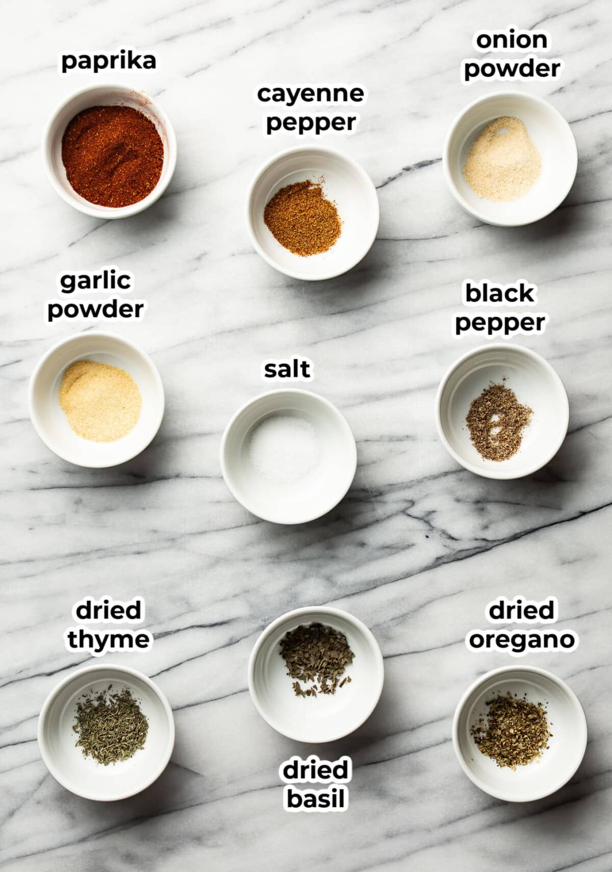 ingredients for blackened seasoning in prep bowls