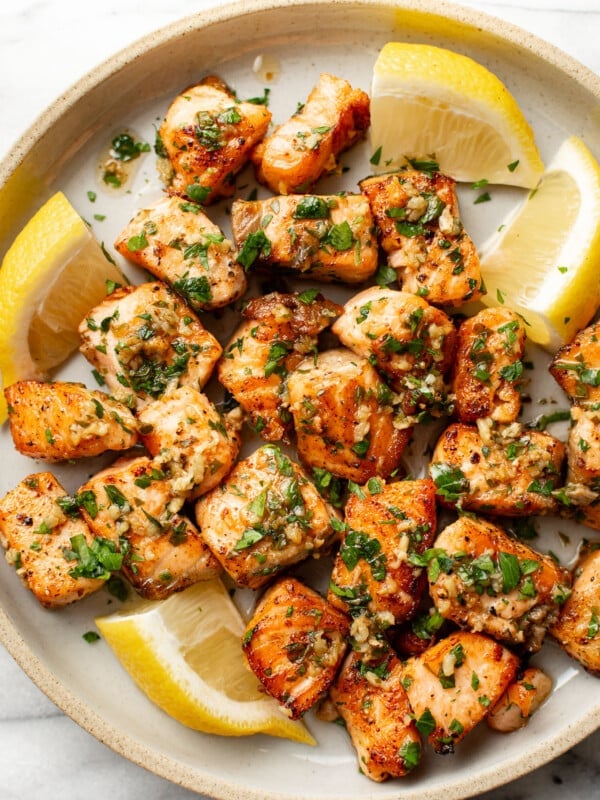 a plate with garlic butter salmon bites