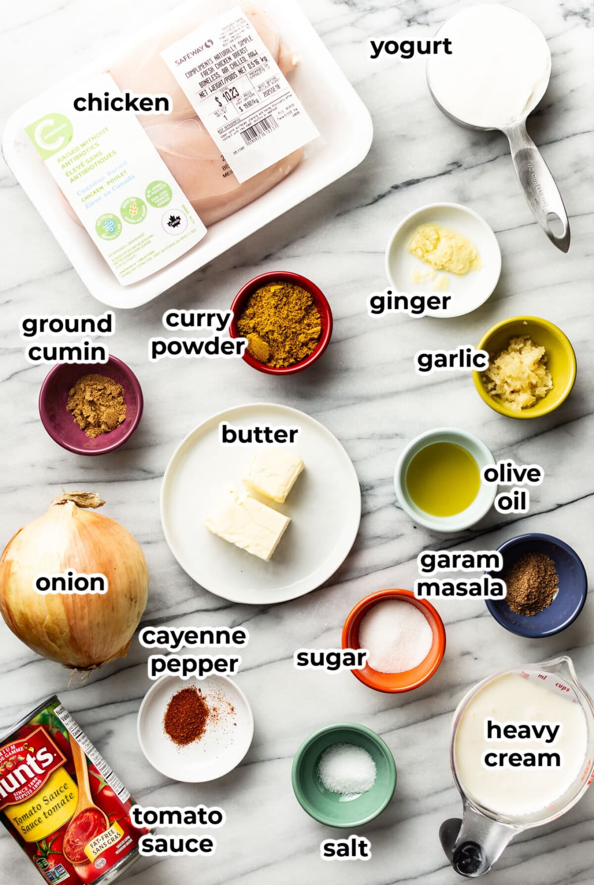 ingredients for butter chicken in prep bowls