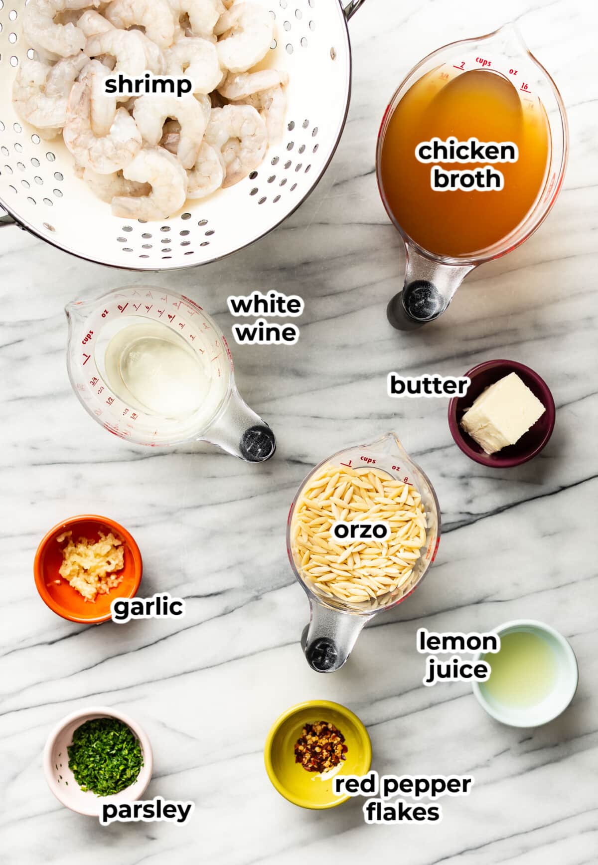 ingredients for shrimp scampi orzo in prep bowls