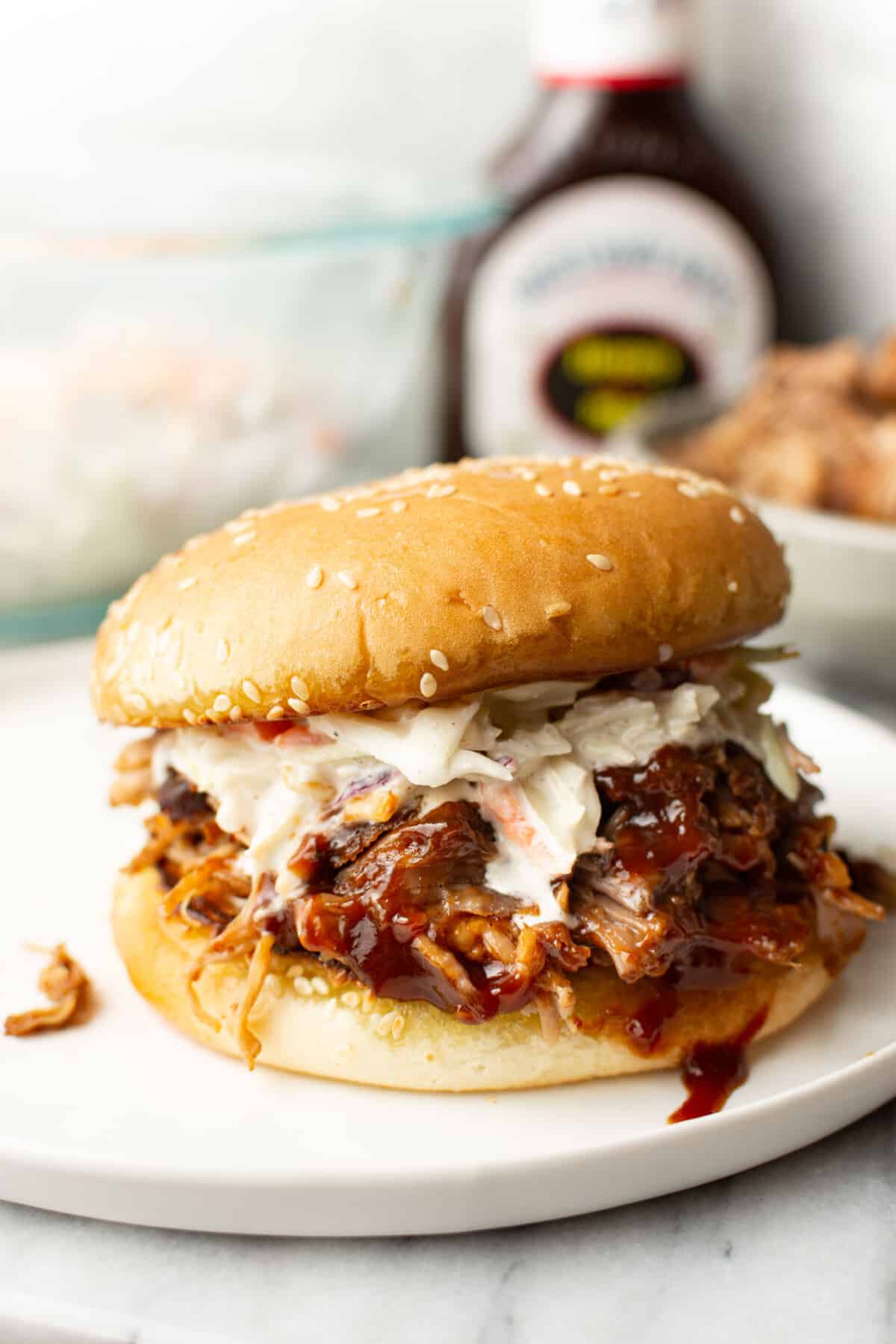 a pulled pork sandwich with coleslaw