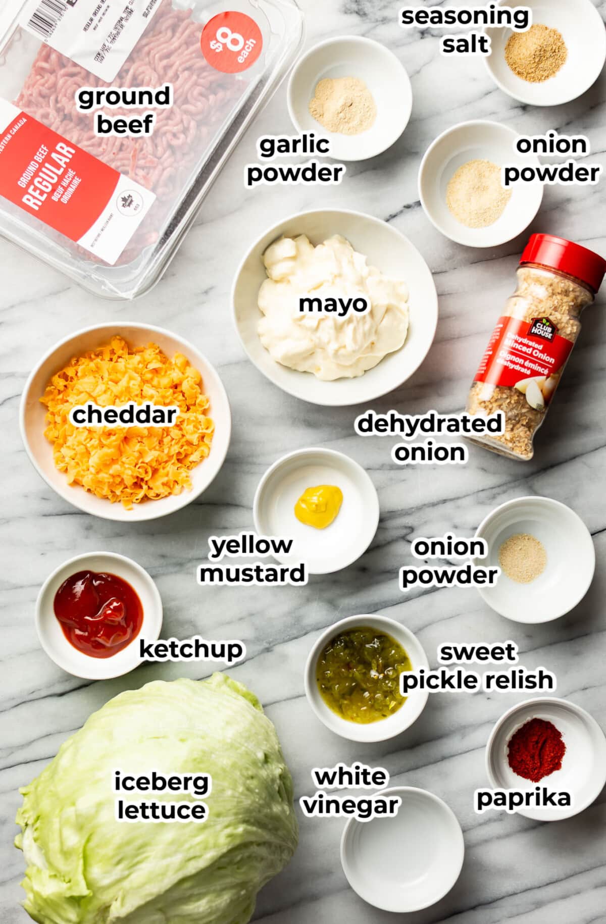 ingredients for big mac salad in prep bowls