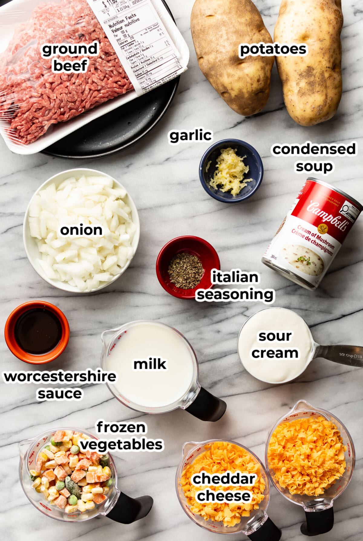 ingredients for ground beef and potato casserole in prep bowls