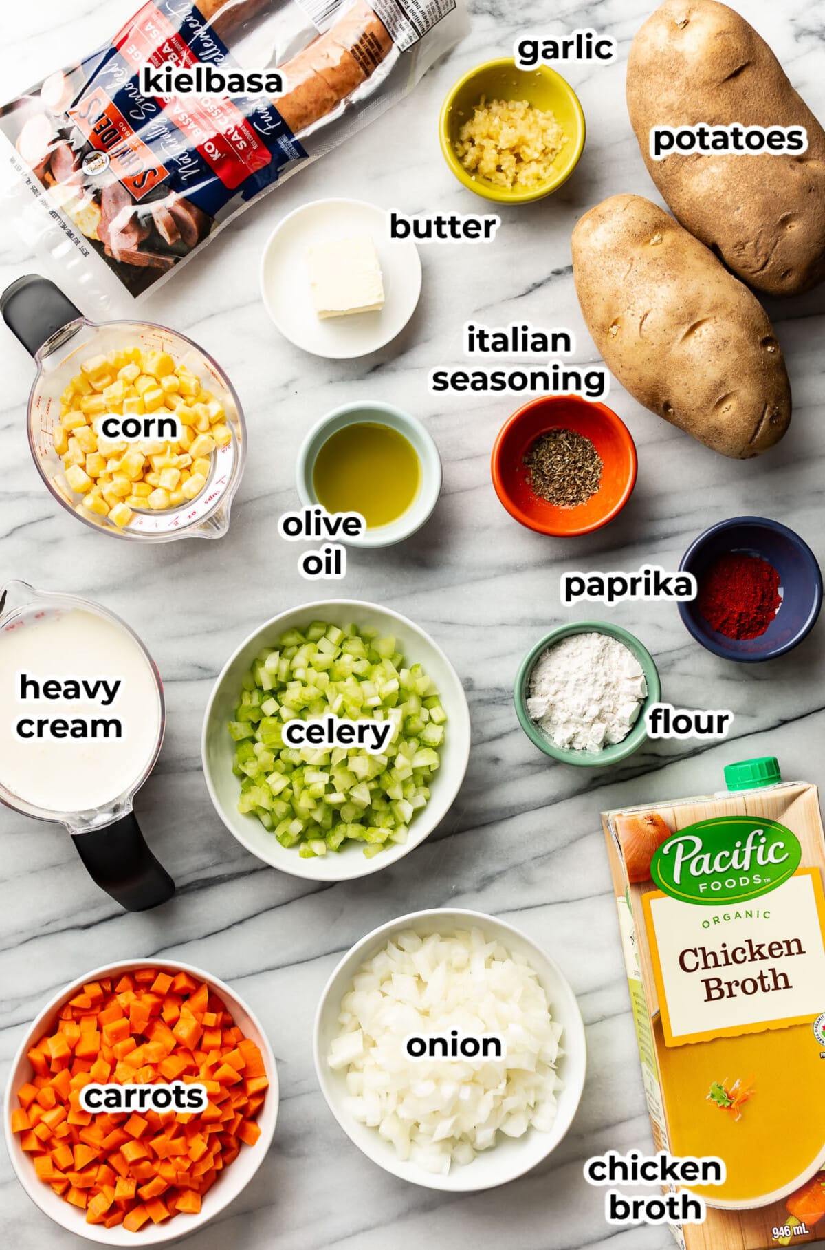 ingredients for creamy kielbasa soup in prep bowls