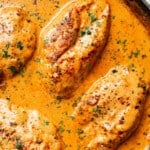a skillet with creamy paprika chicken